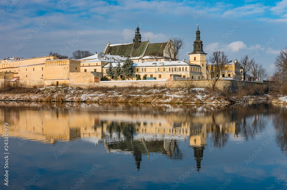 Fototapeta premium Krakow, Poland, winter landscape of Vistula river and Norbertine sisters monastery