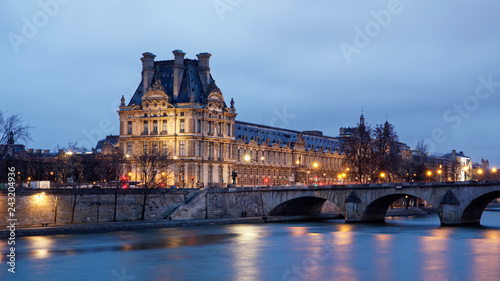 Photos Paris, France - January 12, 2018: Louvre museum viewed from Orsay quay