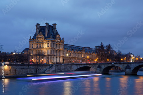Paris, France - January 12, 2018: Louvre museum viewed from Orsay quay