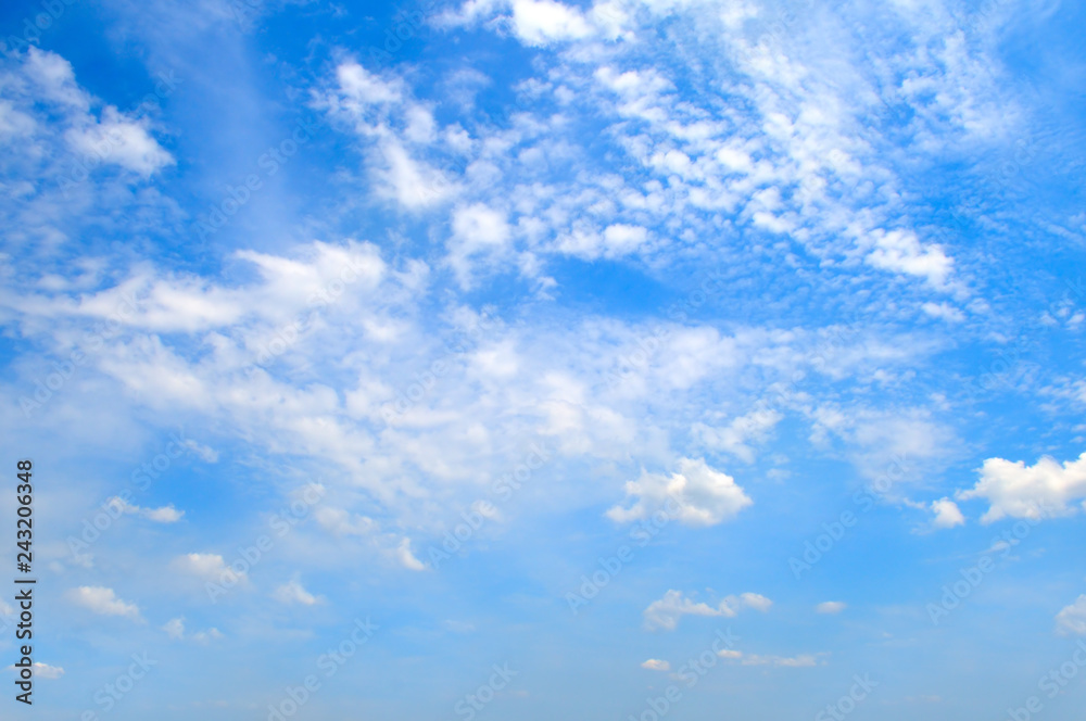 Cumulus clouds in the blue sky. A bright sunny day Cumulus clouds in the blue sky. A bright sunny day