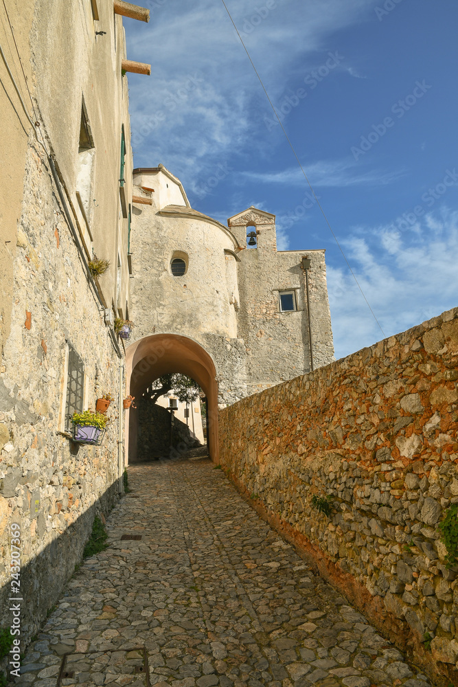 Narrow stone lane in the ancient village of Borgio Verezzi in Liguria, elected one of the most beautiful borough of Italy