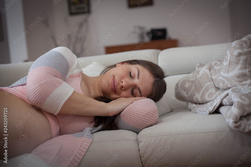Pregnant woman relaxing at home. Pregnant woman relaxing at home.