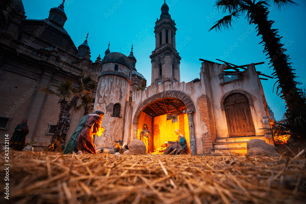 Bethlehem formed by plaster figures at Christmas, in Plaza de Pilar de Zaragoza in Spain