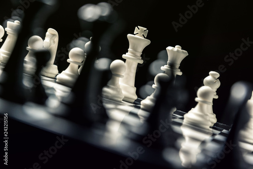 Chess board with black and white chess facing each other