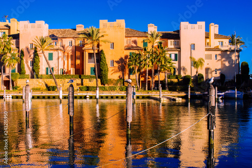 Port of Sotogrande. Port, sea, yachts and colorful houses. Sotogrande, Costa del Sol, Andalusia, Spain. Picture taken – 13 January 2019.