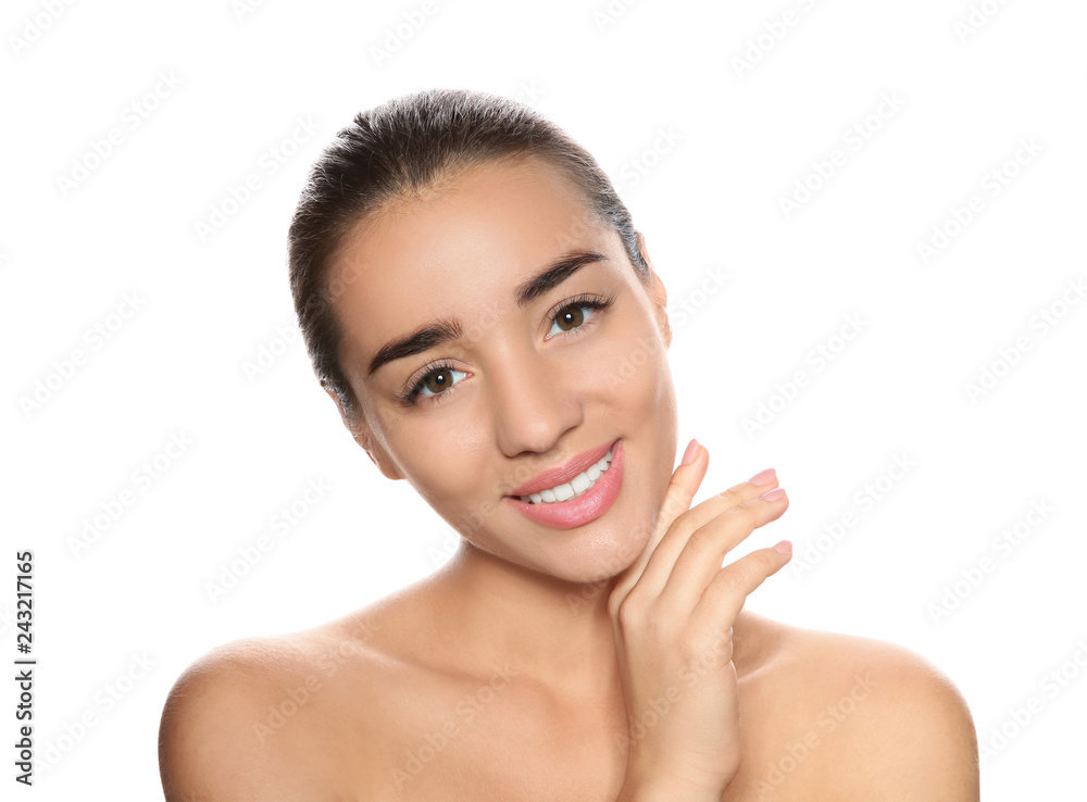 Portrait of young woman with foundation on her face against white background Portrait of young woman with foundation on her face against white background