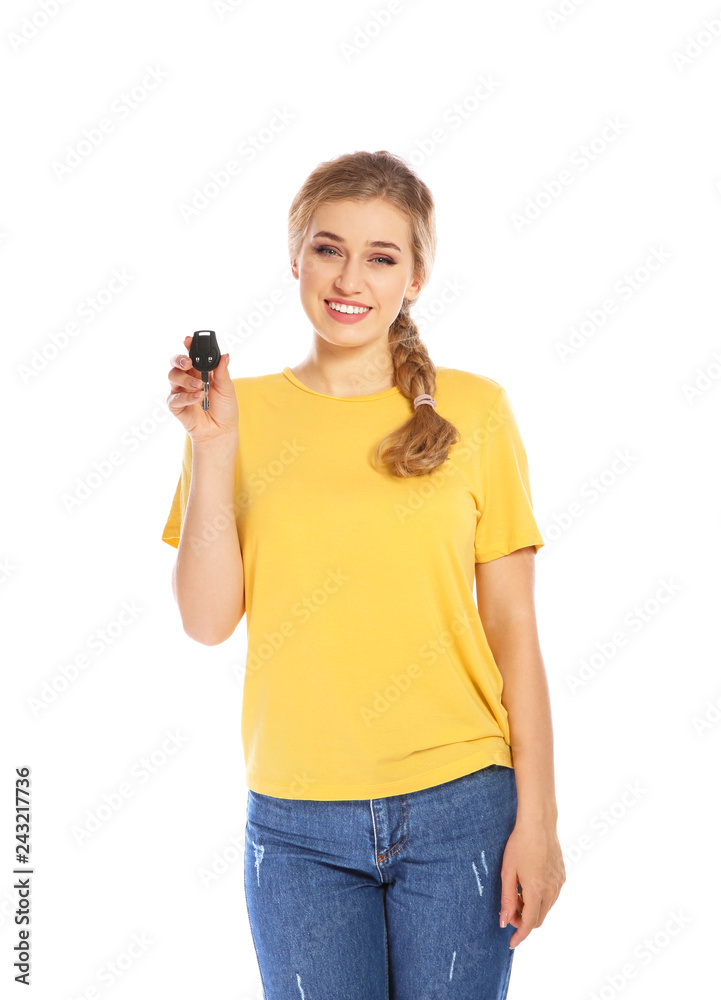 Happy young woman with car key on white background. Getting driving license Happy young woman with car key on white background. Getting driving license