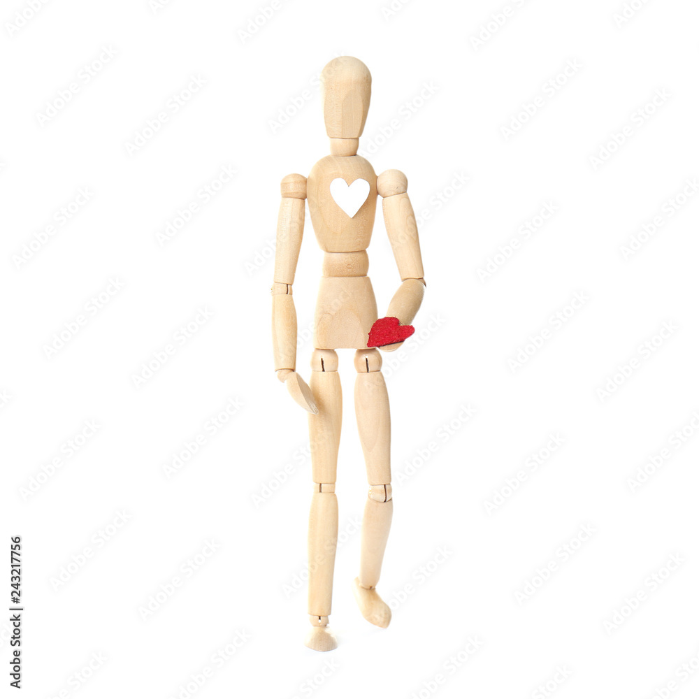 Wooden puppet with small heart on white background. Relationship problems Wooden puppet with small heart on white background. Relationship problems
