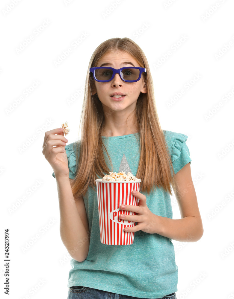 Fototapeta premium Emotional teenage girl with 3D glasses and popcorn during cinema show on white background