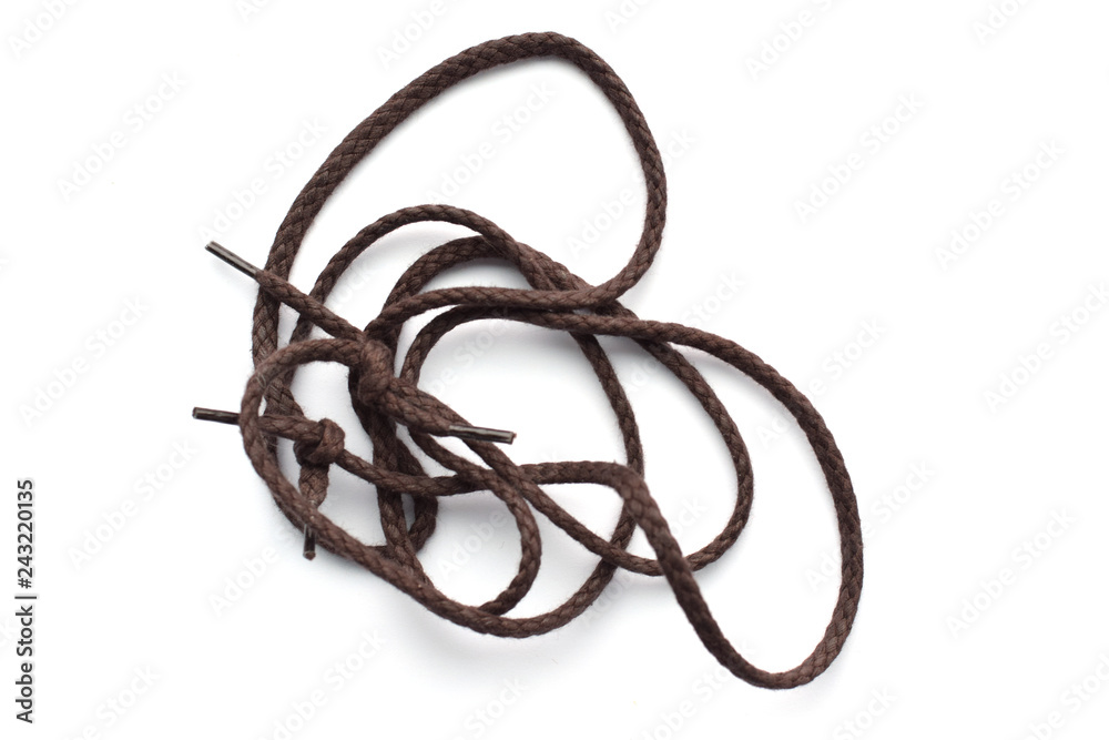 Pile of brown shoelaces for tying shoes Pile of brown shoelaces for tying shoes