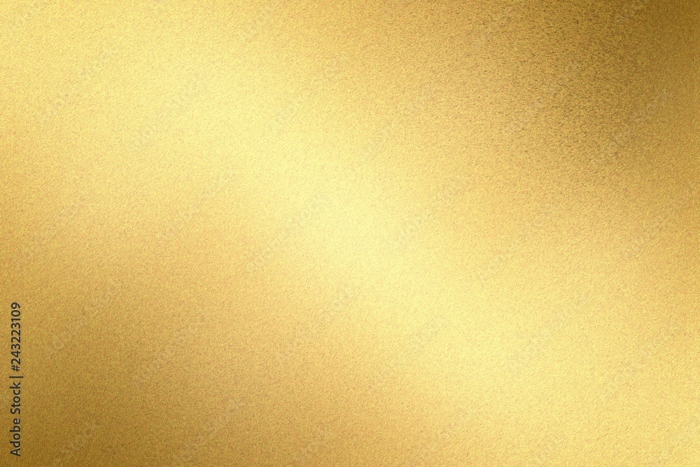 Glowing light brass metal wall texture, abstract pattern background Glowing light brass metal wall texture, abstract pattern background