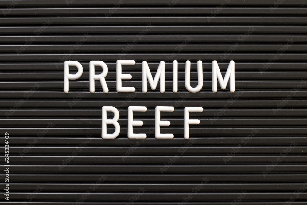 Black color felt letter board with white alphabet in word premium beef background Black color felt letter board with white alphabet in word premium beef background