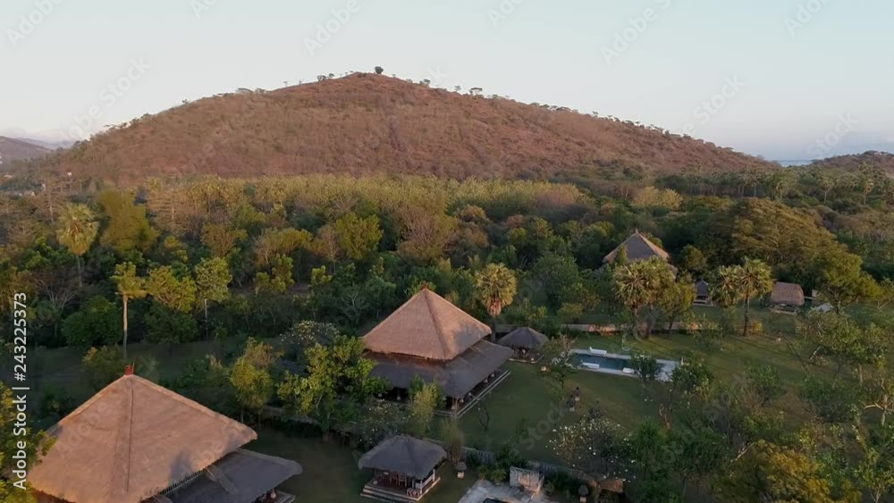 Aerial view of luxury bungalow surrounding by forest, Bali island, Indonesia. Aerial view of luxury bungalow surrounding by forest, Bali island, Indonesia.