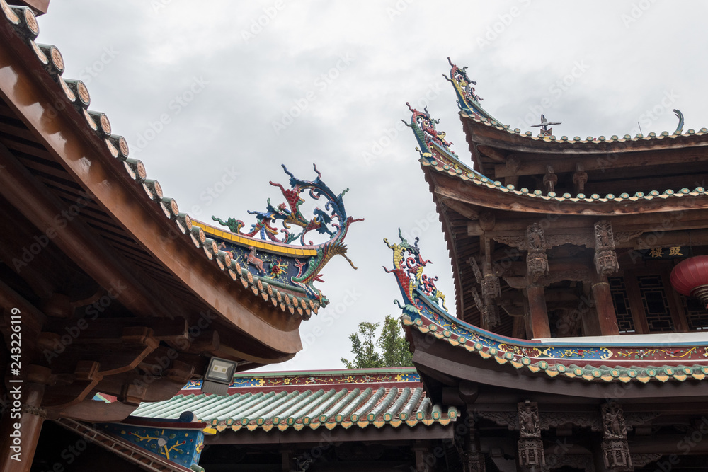 Detail of roof carvings on South Putuo or Nanputuo Temple