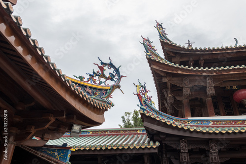 Detail of roof carvings on South Putuo or Nanputuo Temple