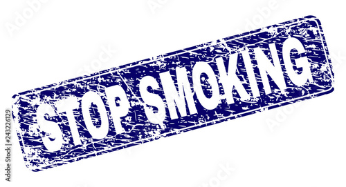 STOP SMOKING stamp seal print with distress style. Seal shape is a rounded rectangle with frame. Blue vector rubber print of STOP SMOKING label with scratched style.