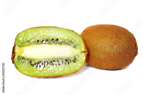 Slices and whole yellow tropical exotic kiwi fruit on white background. Isolated