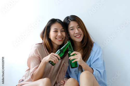 Canvas Print Two asian women drinking beer at party, celebration, LGBT couple, lifestyle