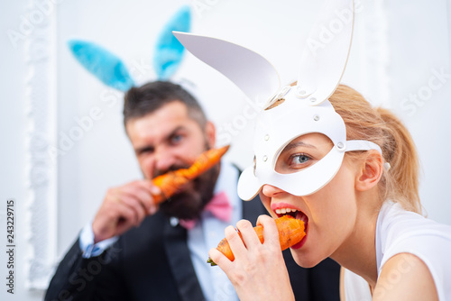 Easter egg couple. Smile easter. Cute bunny rabbit eating carrot. Easter bunny eat carrot.