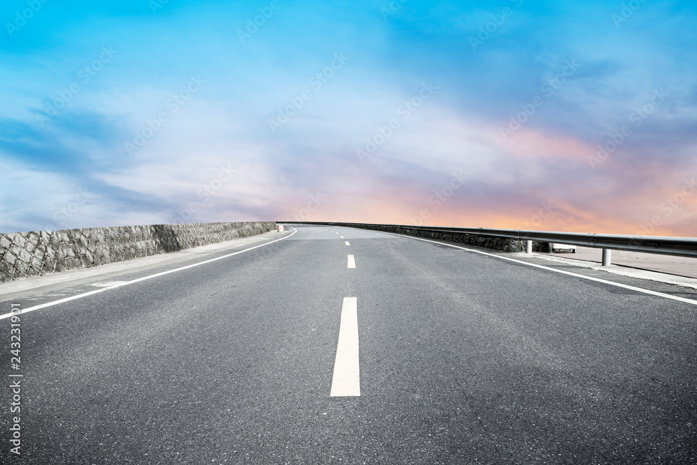 Fototapeta premium Sky Highway Asphalt Road and beautiful sky sunset scenery