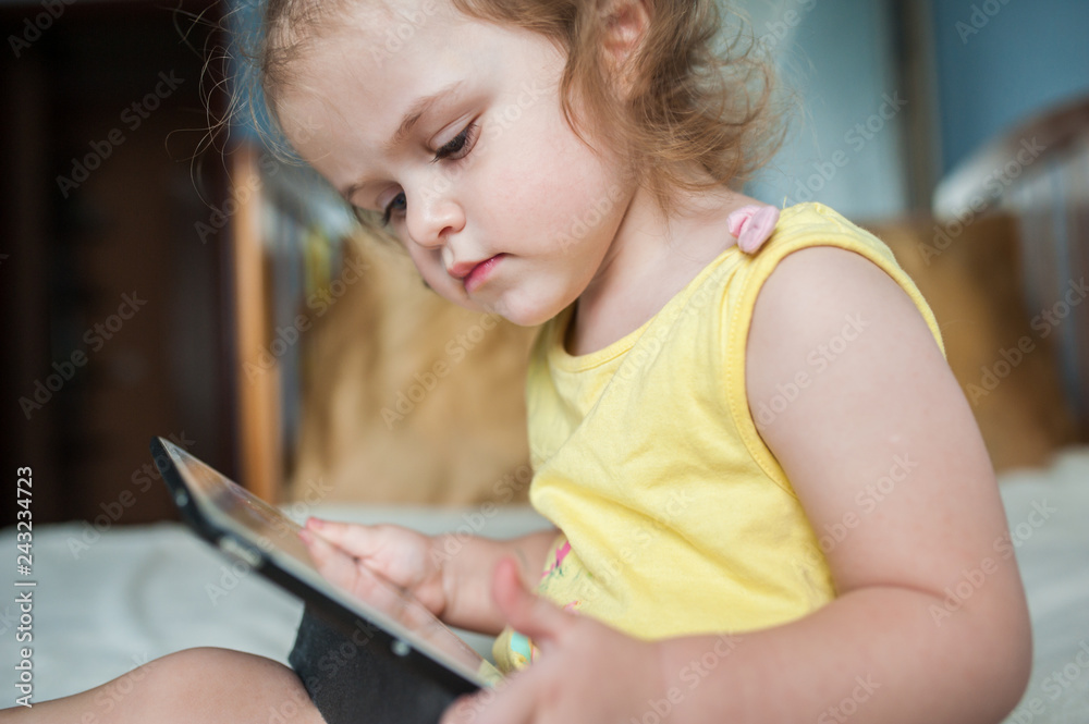 Happy child with tablet computer. Happy child with tablet computer.