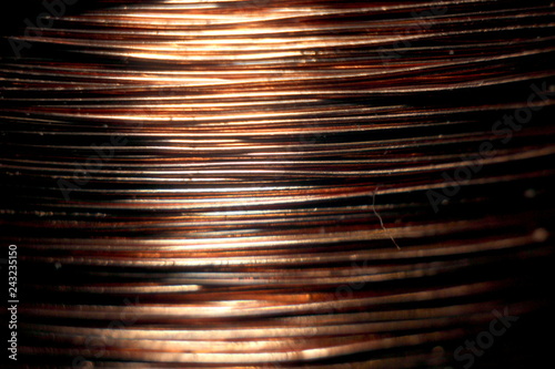 copper coil with contactor in macro, copper background