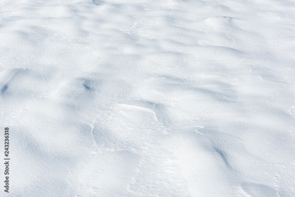 Large snowdrifts on a snowy field Large snowdrifts on a snowy field