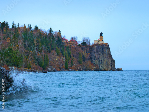 Waves break on shoreline atSplit Rock Lighthouse on the north shore of Lake Superior near Duluth and Two Harbors, Minnesota photo