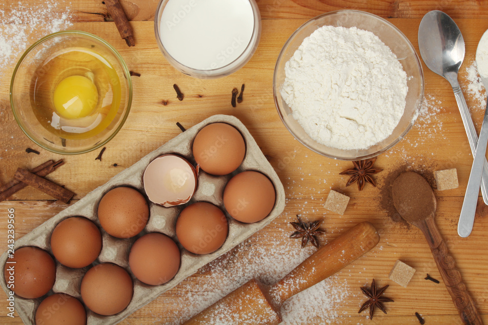 Food ingredients for baking: flour, eggs, milk, sugar Food ingredients for baking: flour, eggs, milk, sugar