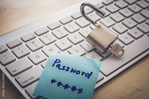 Unlock key and secret password note on keyboard.