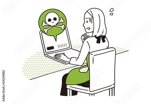 パソコンを操作する主婦。