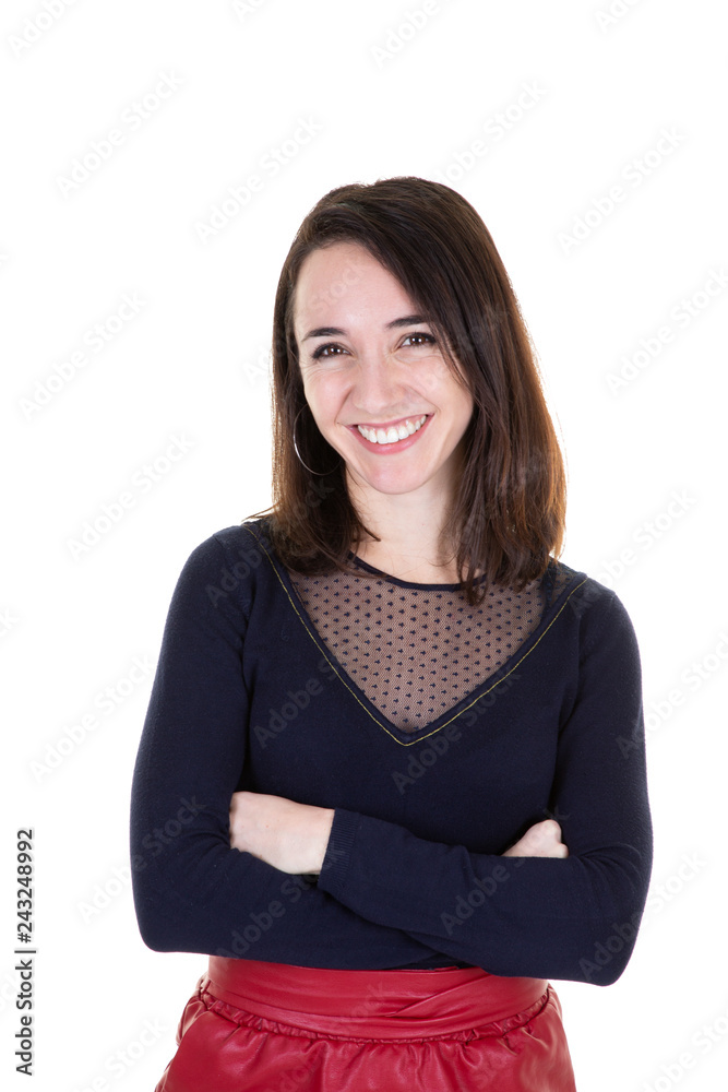 Front view portrait of a happy girl with perfect smile looking at camera crossed arms Front view portrait of a happy girl with perfect smile looking at camera crossed arms