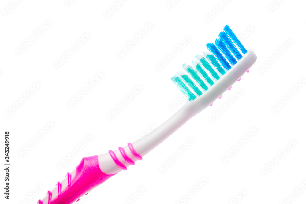 colored toothbrush on an isolated background, close up colored toothbrush on an isolated background, close up