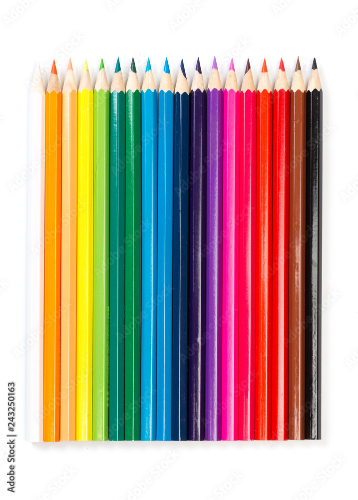Colour pencils on white background, top view. Colour pencils on white background, top view.
