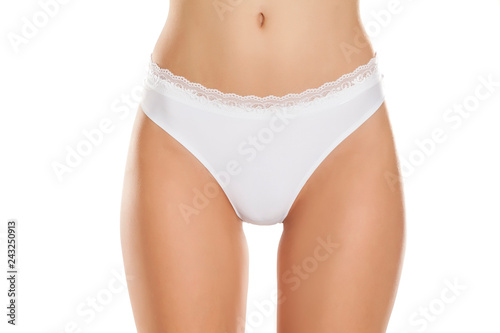 front view of female hips with white panties on white background