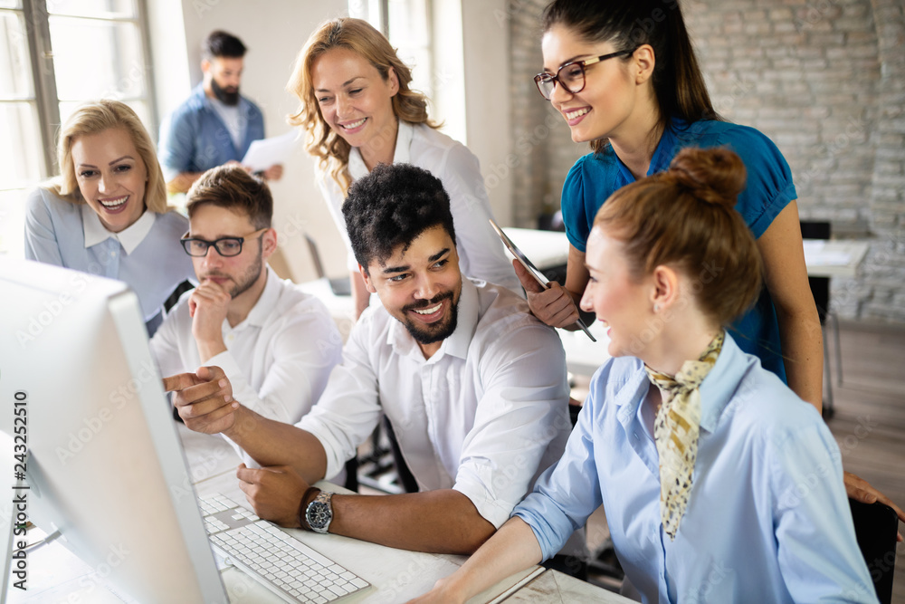 Successful business group working at the office. Successful business group working at the office.
