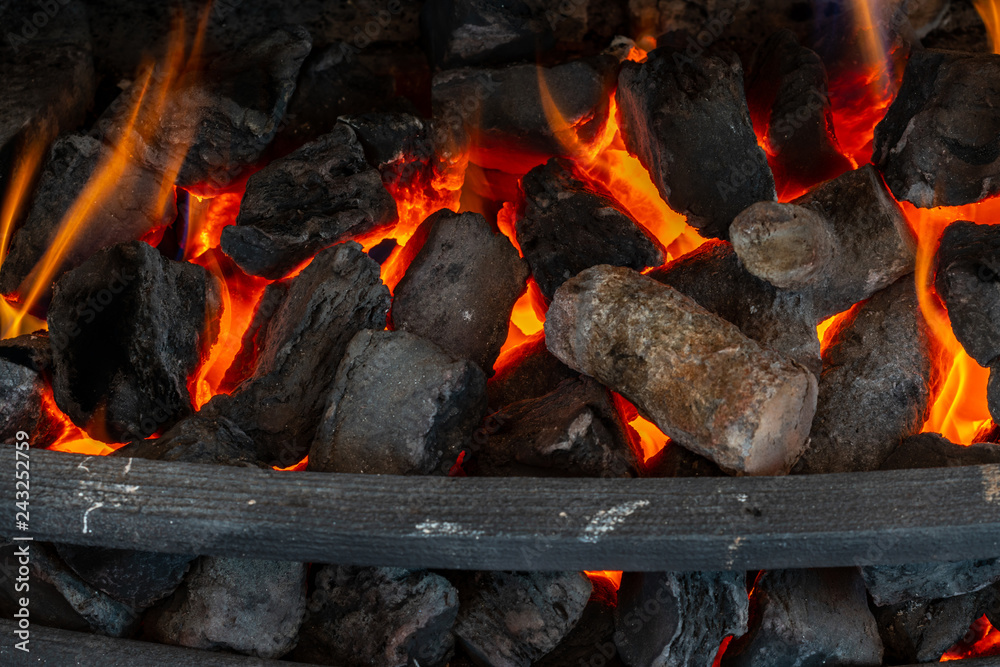 Close up of burning firewood in the fireplace. Close up of burning firewood in the fireplace.