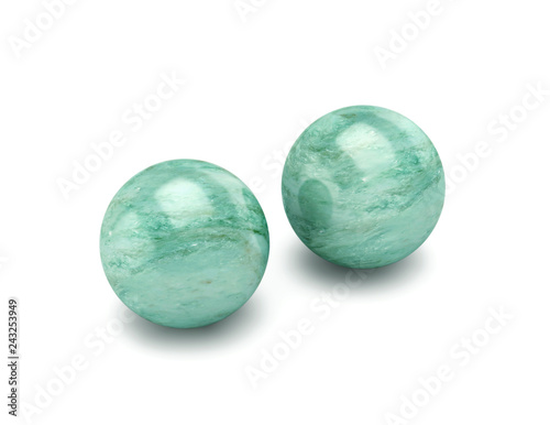 Two polished stone spheres, meditation balls isolated on white. Clipping path included