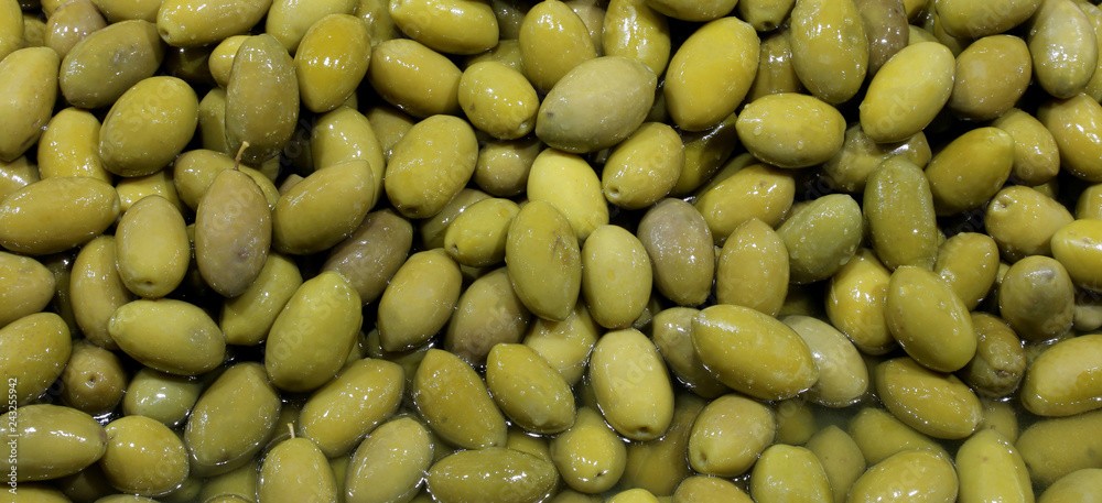 green pickled olives for sale in the Italian food stand green pickled olives for sale in the Italian food stand