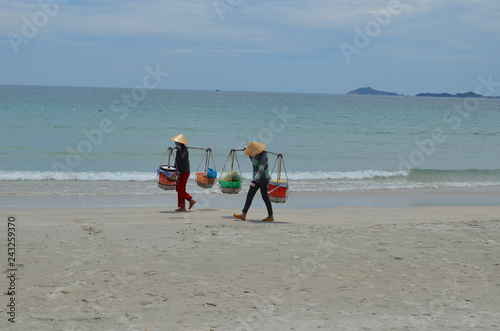 Vietnamese sales women on the beach