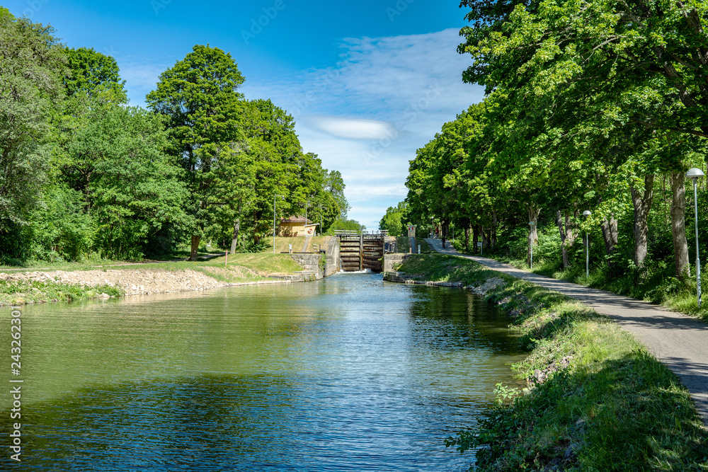 Summer view of a sea lock at Gota canal in Sweden Summer view of a sea lock at Gota canal in Sweden