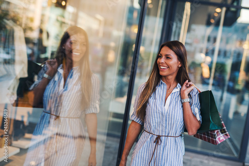 Woman looking at the store window