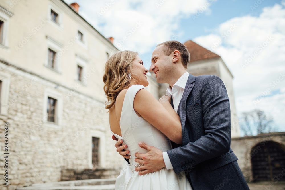 Wedding couple. Pretty bride and stylish groom.