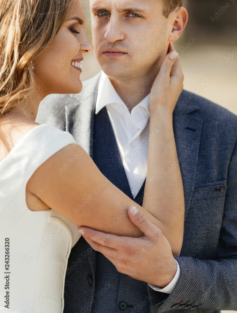 Fototapeta premium Wedding couple. Pretty bride and stylish groom.