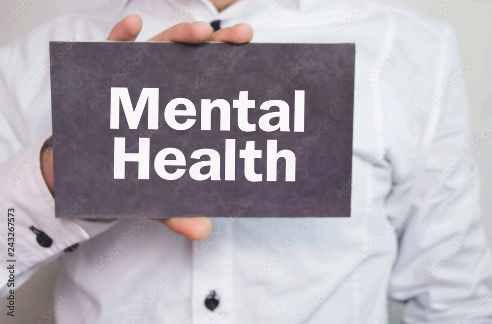 Man showing word Mental Health on cardboard. Man showing word Mental Health on cardboard.