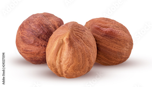 Three peeled hazelnut. Fresh organic filbert