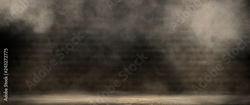 Background of an empty dark room, smoke and dust.
