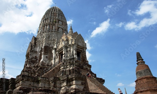 Tourist are around the decadent big pagoda inside of the Wat Mahathat area, Ayutthaya Provice, Thailand, late 2017.