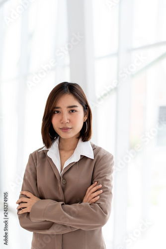 Happy business woman in an office Free Download Happy business woman in an office - GFXLoad