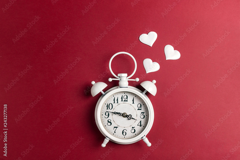 Alarm clock in love on red background. Alarm clock in love on red background.